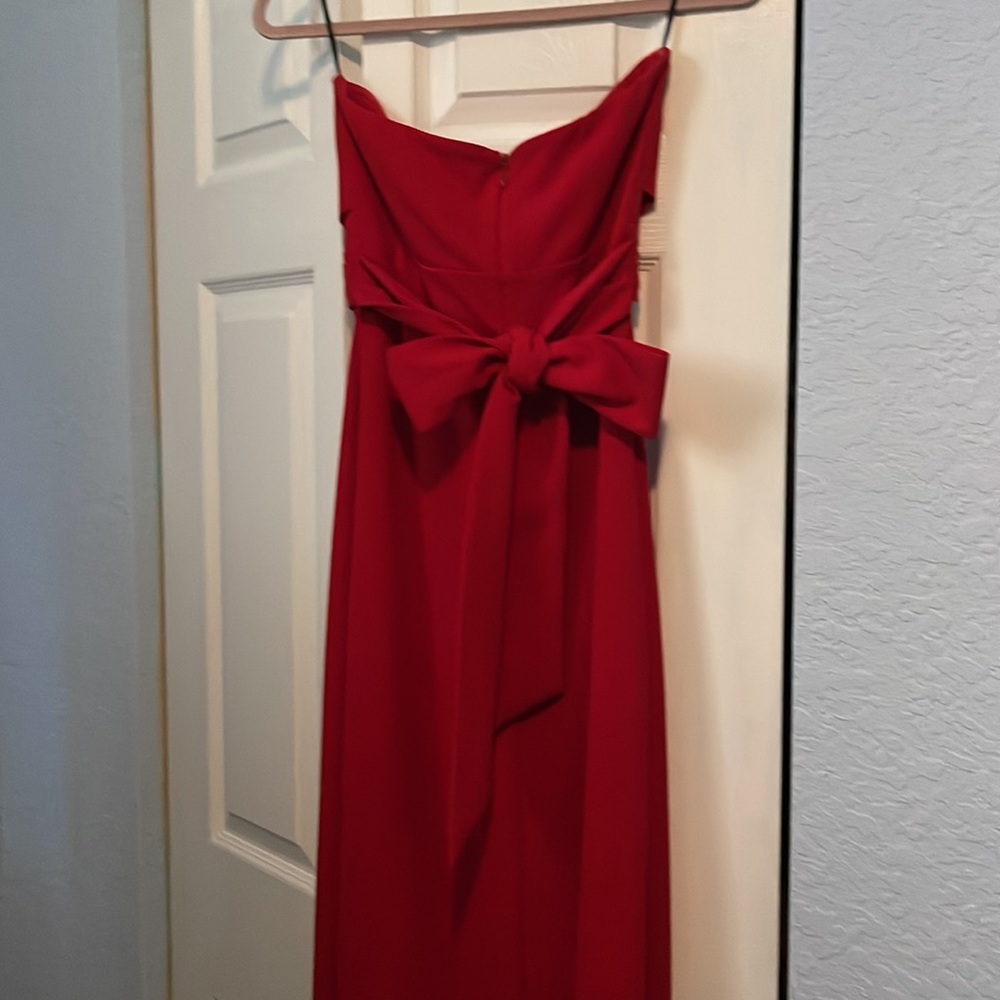 Lulus gorgeous red long dress with bow in back. Size M worn once. Nice material